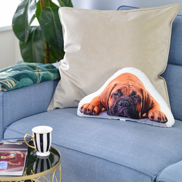 A pillow with a photo of your puppy