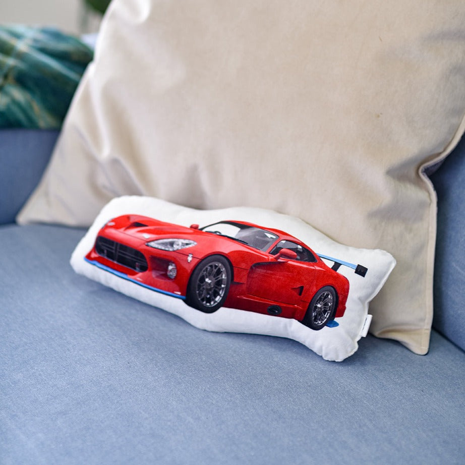A pillow with a photo of your car