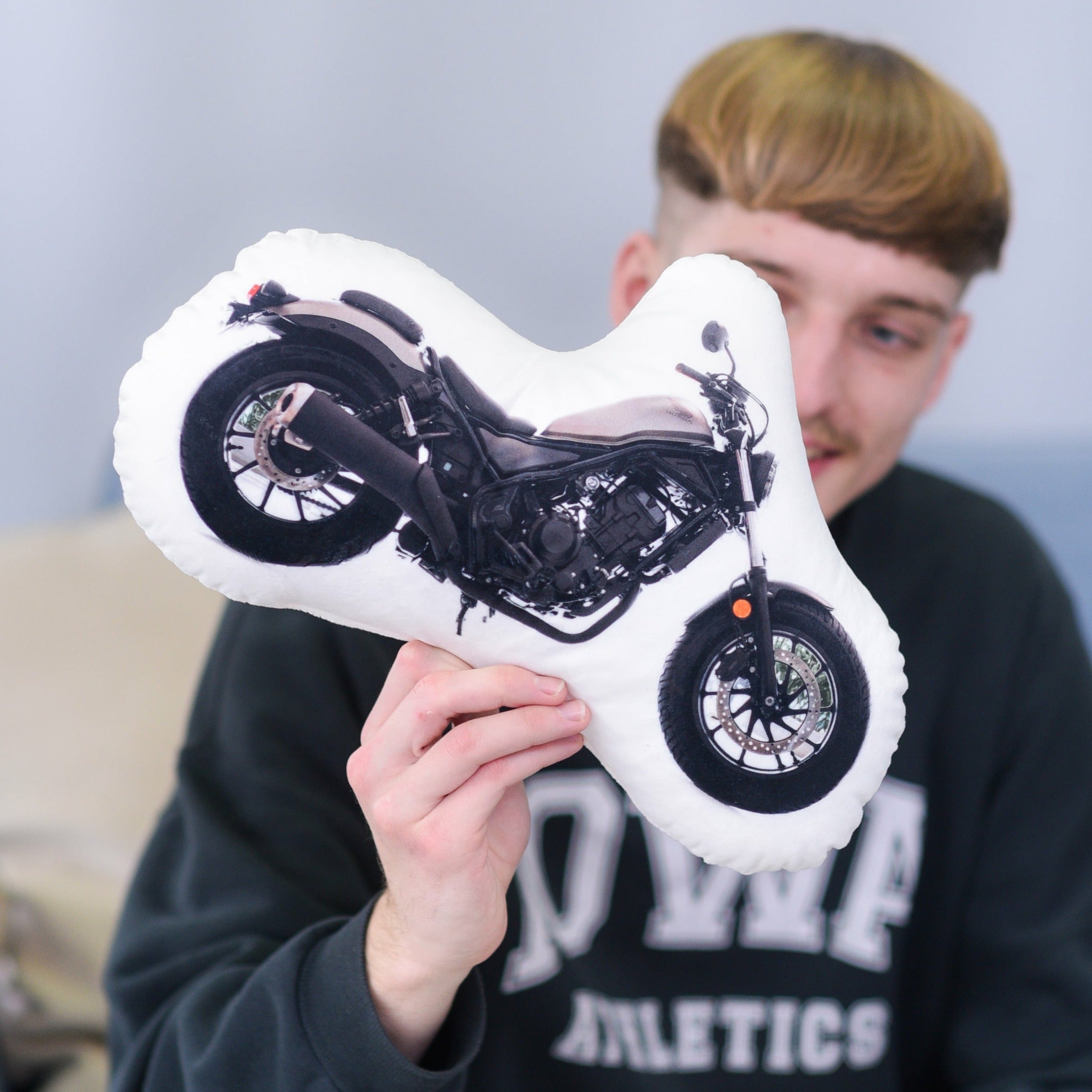 A pillow with a photo of your motorcycle